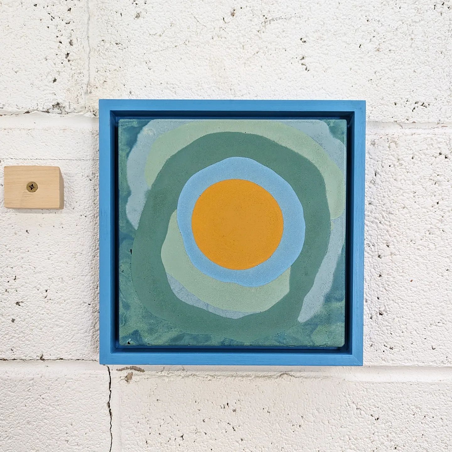 A close up of a piece of abstract artwork