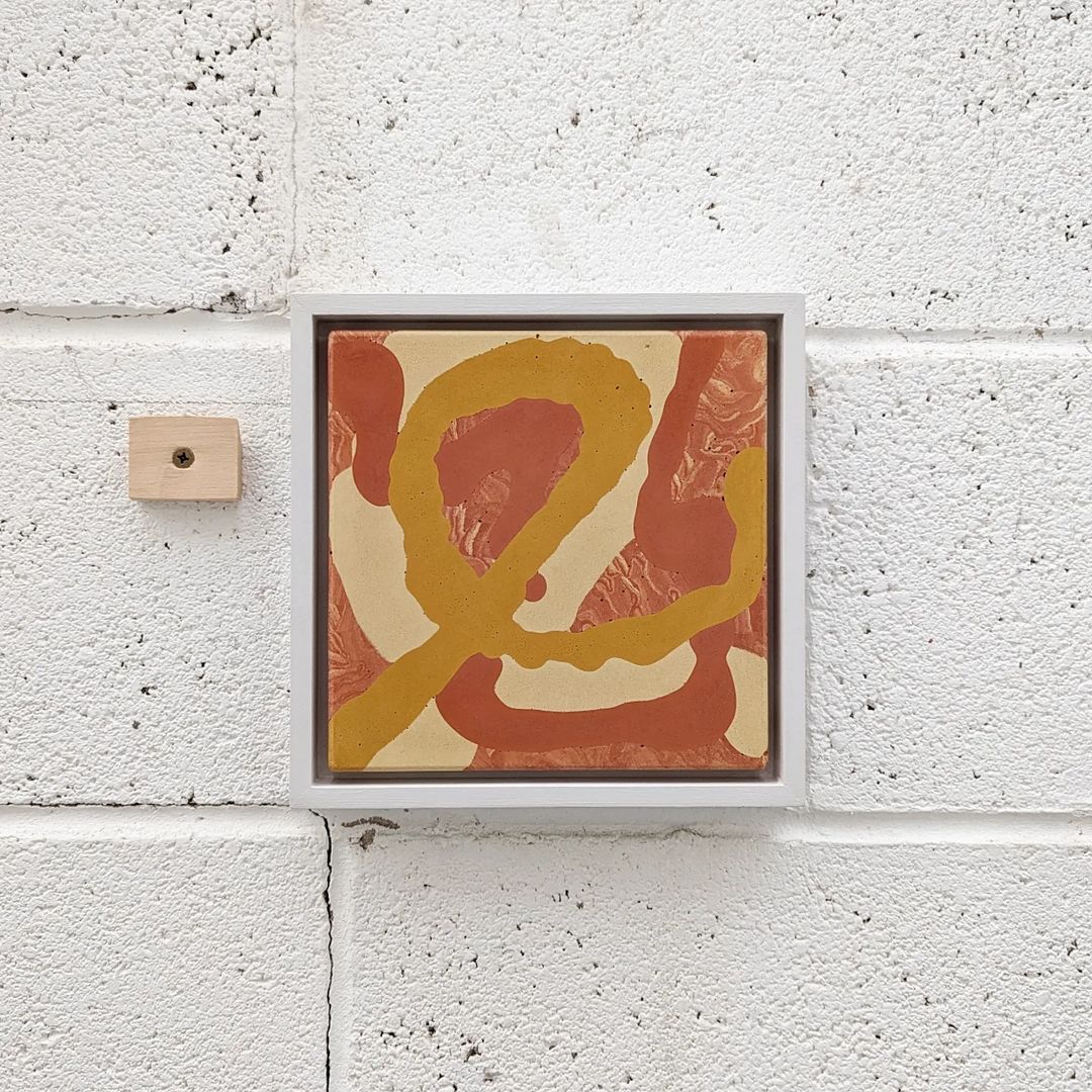 A close up of a piece of abstract artwork