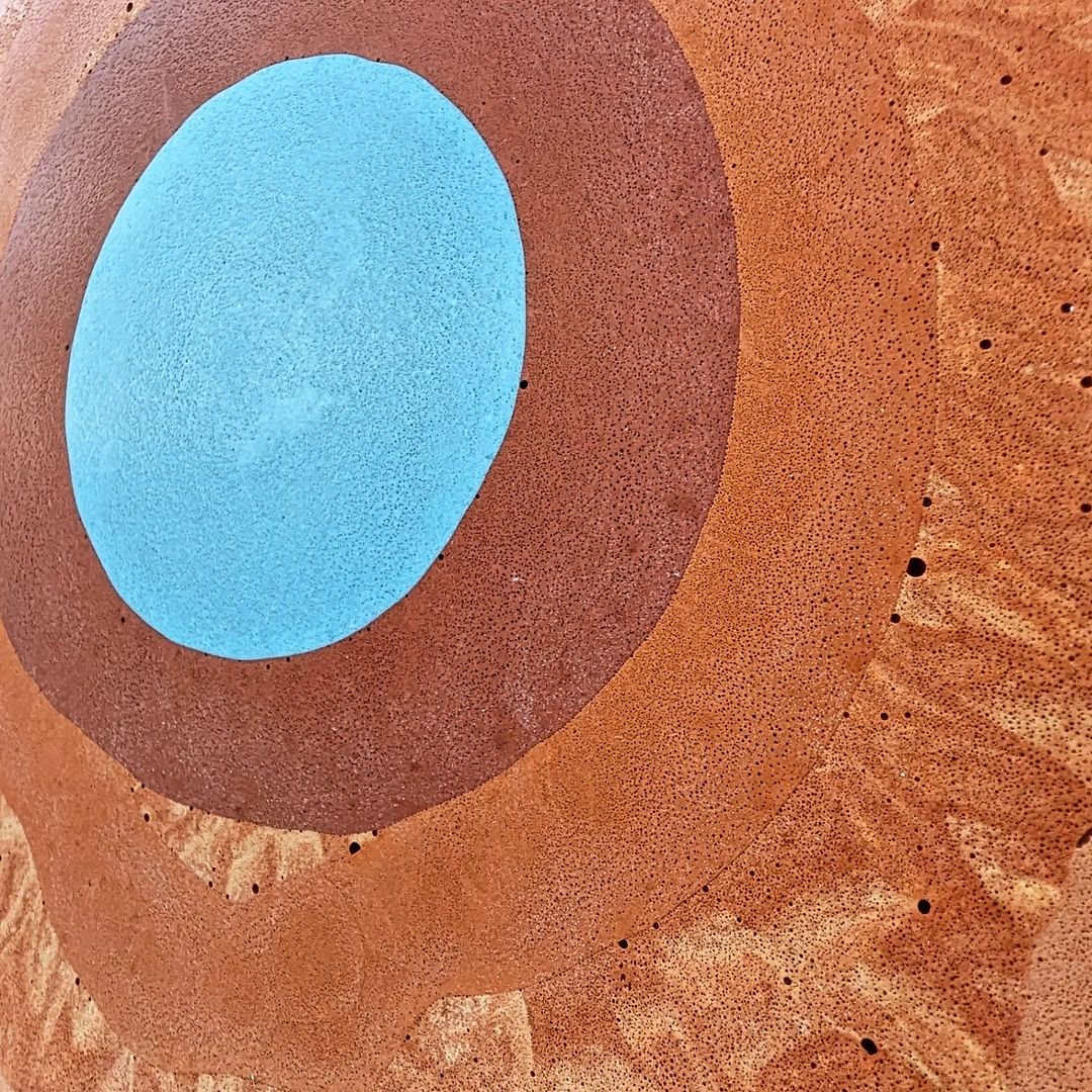 A close up of a piece of abstract artwork