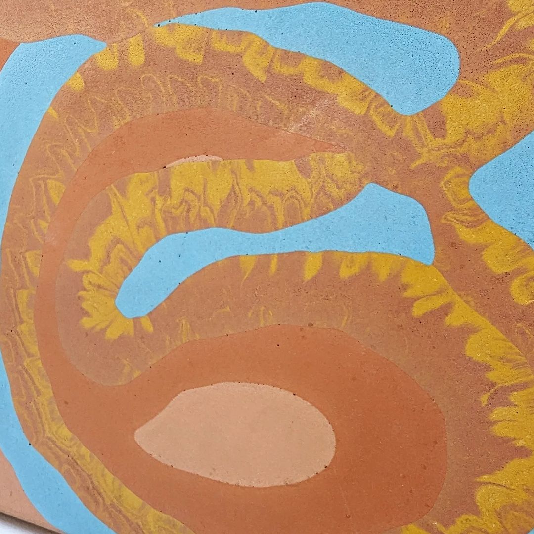 A close up of a piece of abstract artwork