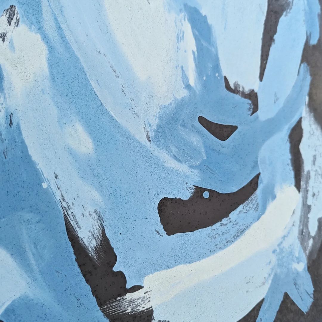 A close up of a piece of abstract artwork